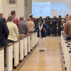 Carrie Gordon singing to the public